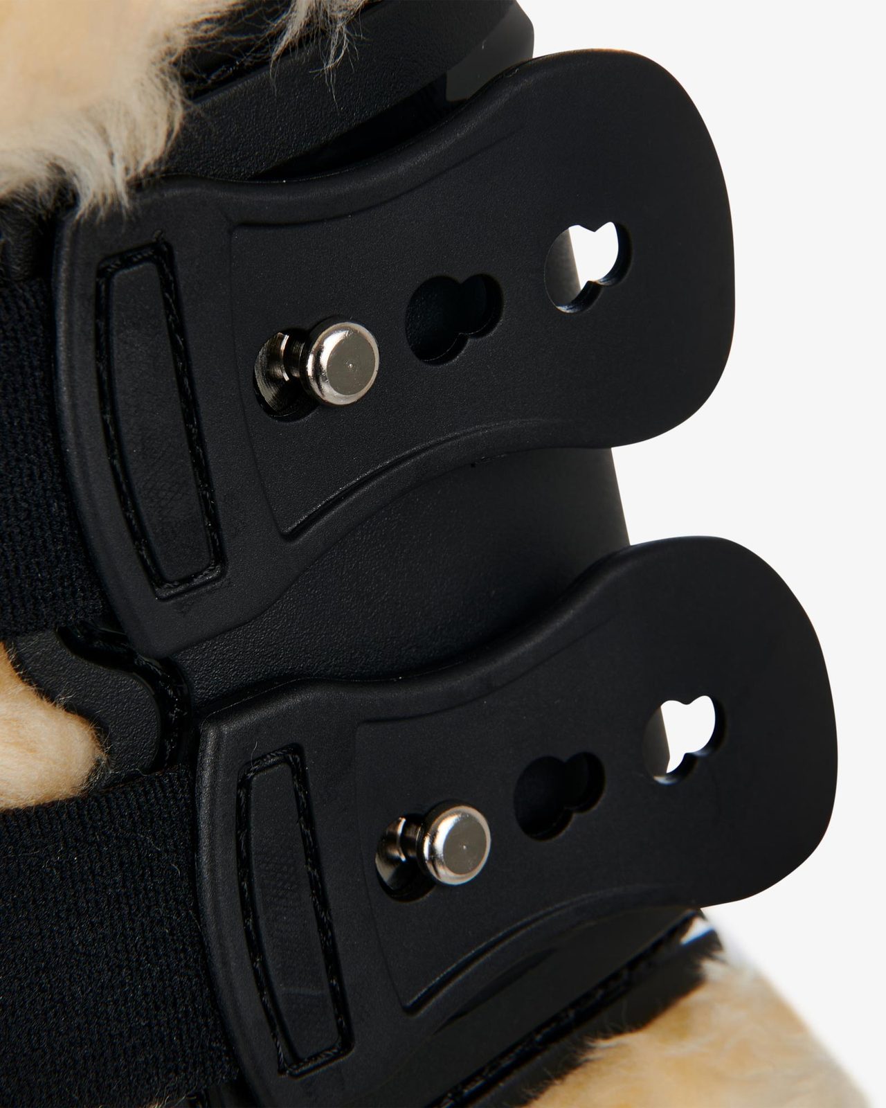 Fetlock boots in polyurethane with synthetic lambskin