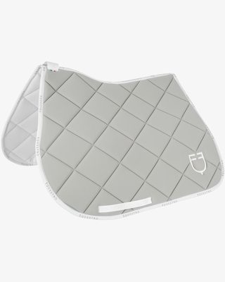 Jumping saddle pad technical fabric with logo