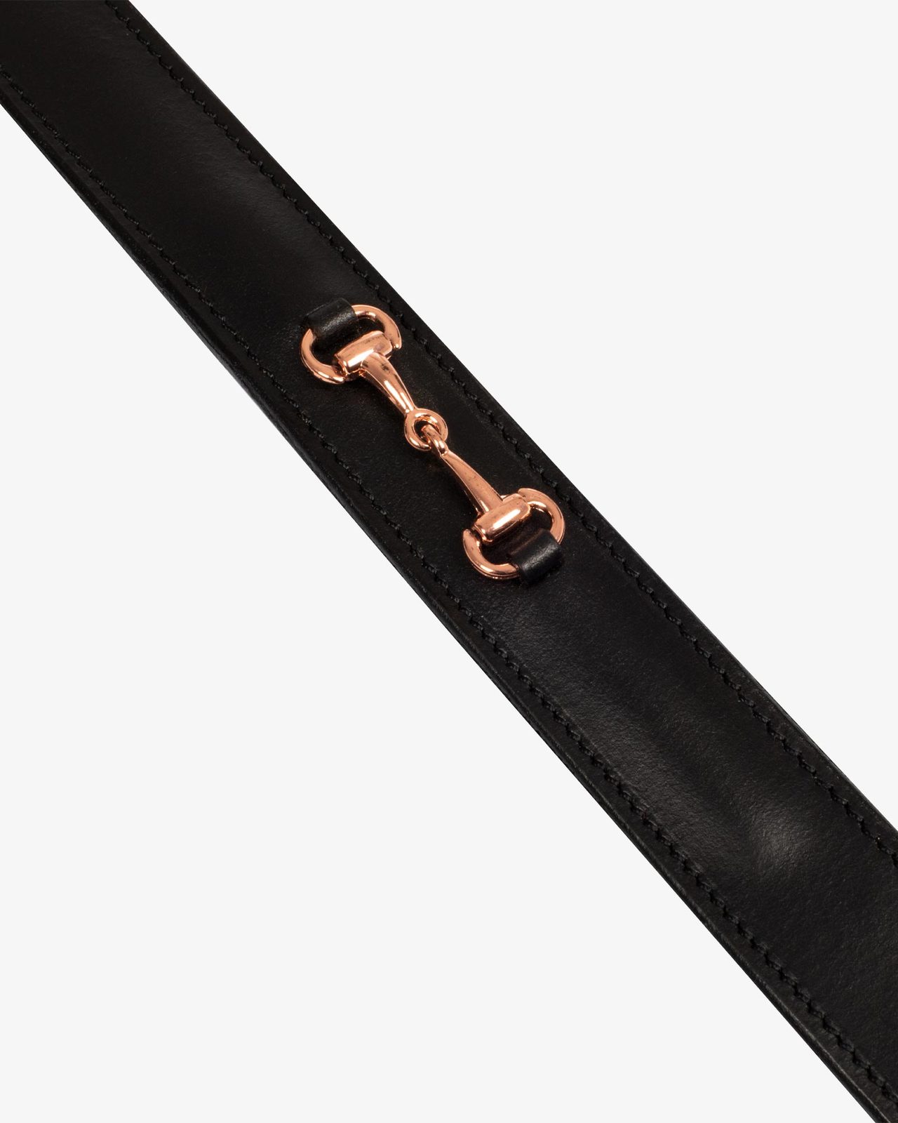 English belt with rose gold snaffle bits