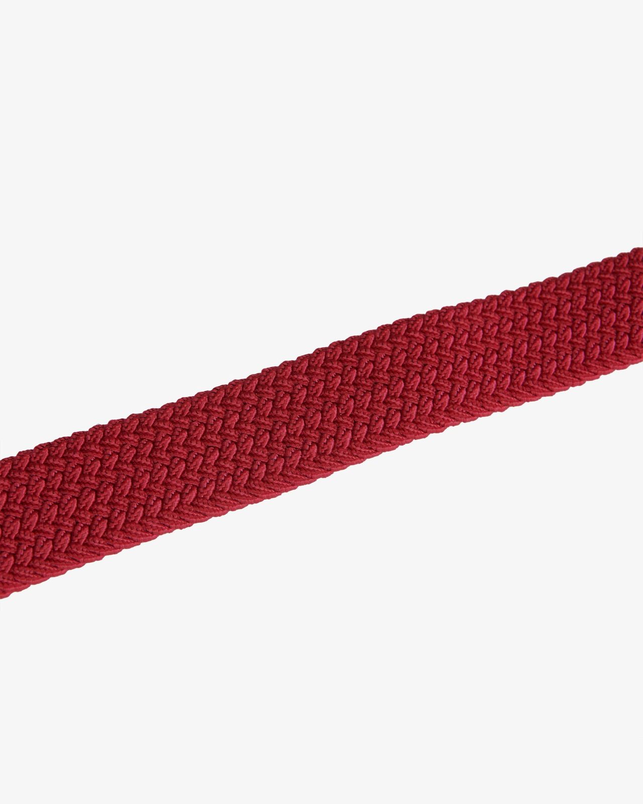 Elasticized belt crossed pattern