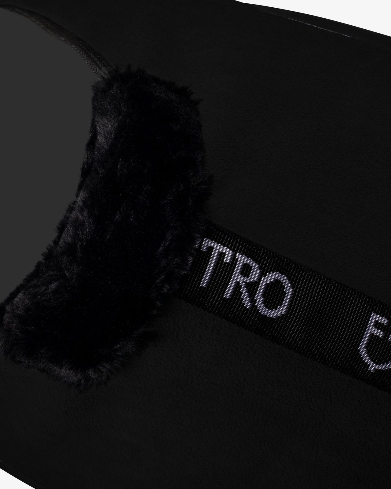 Coperta in pile con chiusura frontale con flap