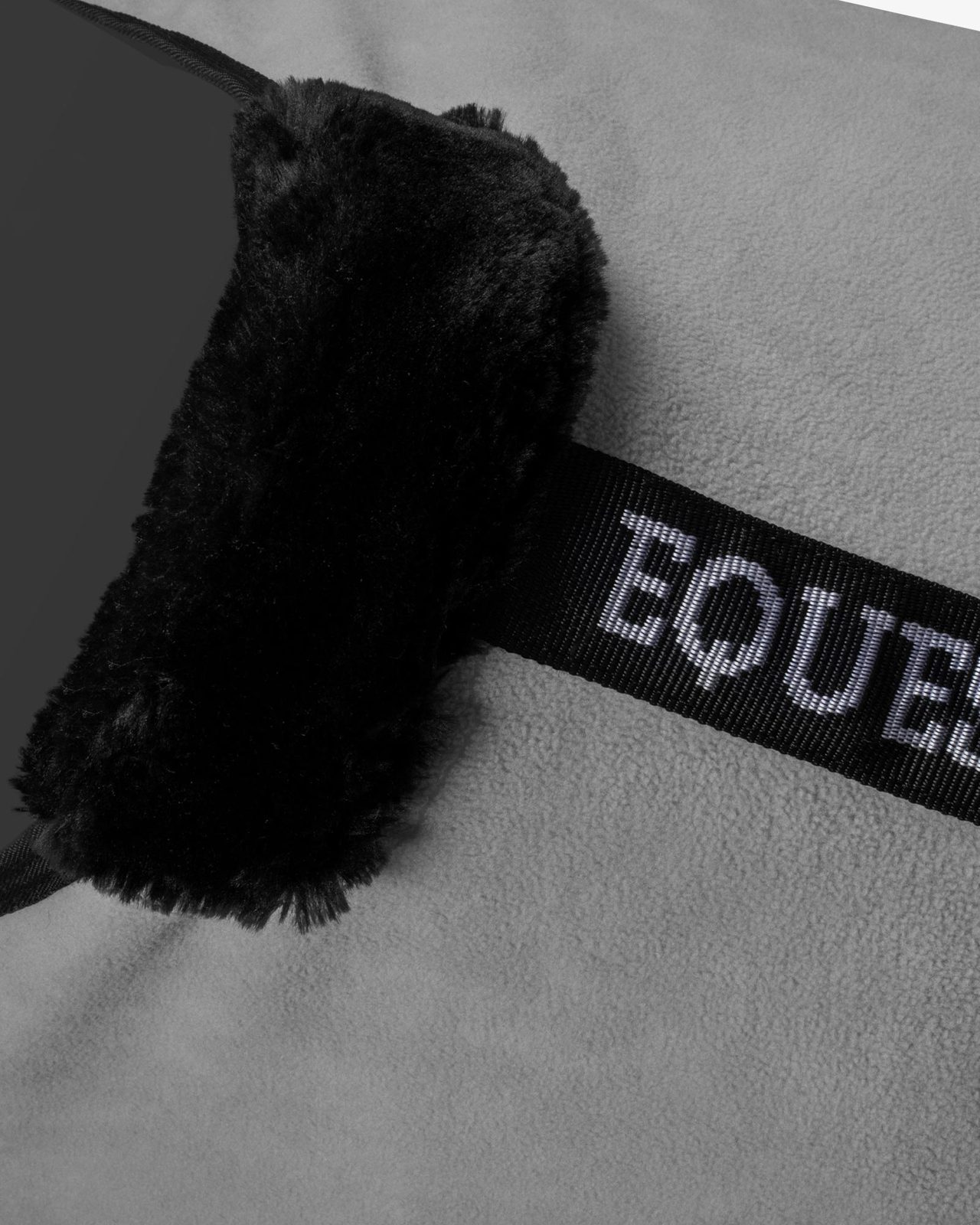 Fleece rug with flap front closure