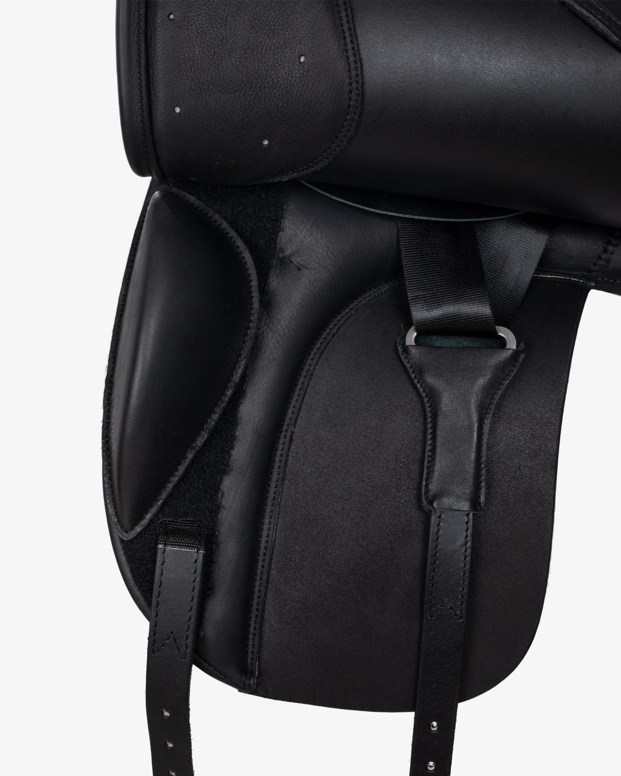 Dressage saddle with removable blocks