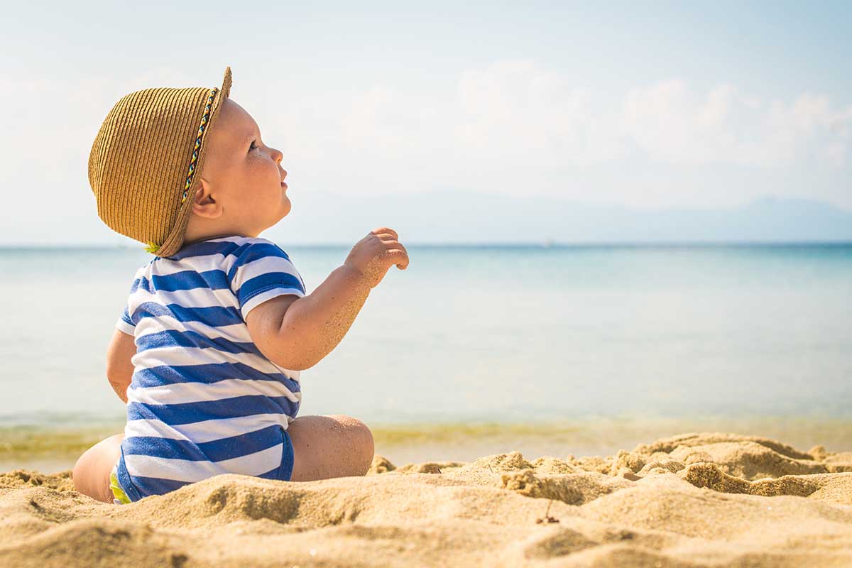 Protezione ed estate: perché la pelle dei bambini non va in vacanza