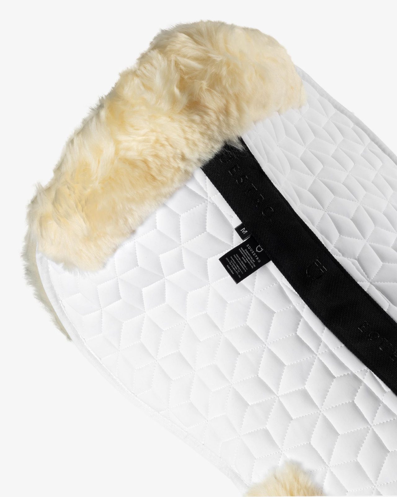 Technical fabric pad with sheepskin
