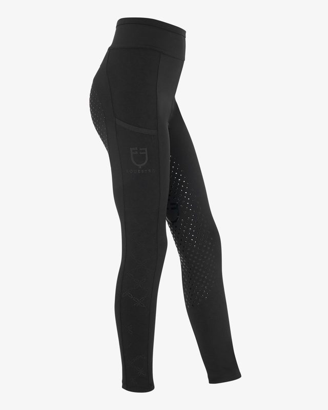Girls' leggings with perforated decorations