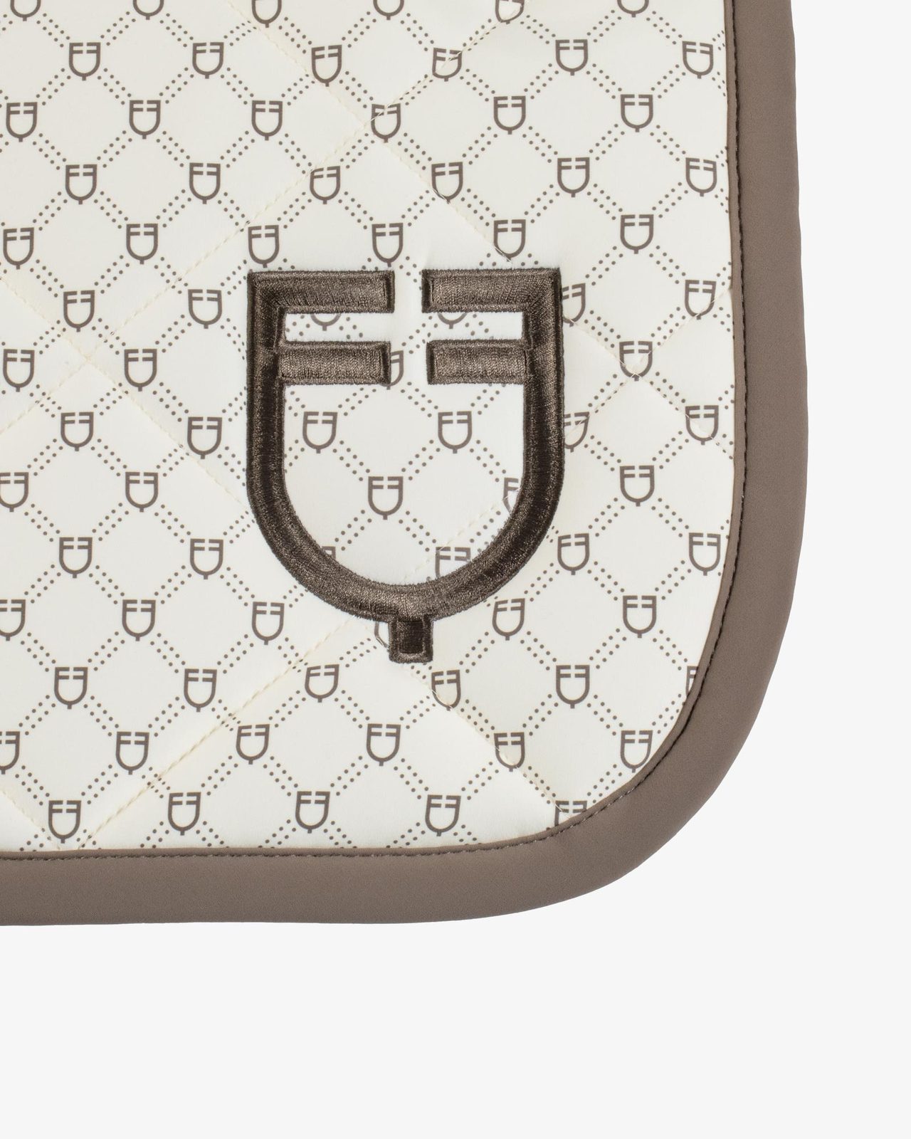 Jumping saddle pad with monogram print