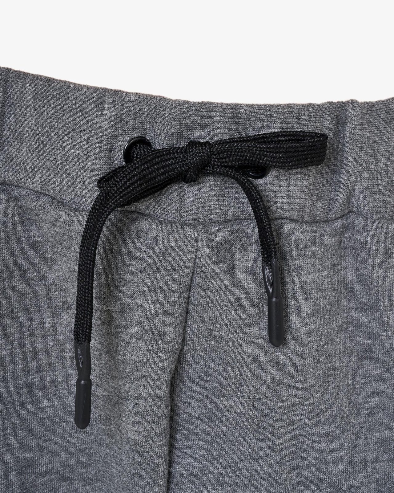 Copri pantaloni donna con apertura laterale