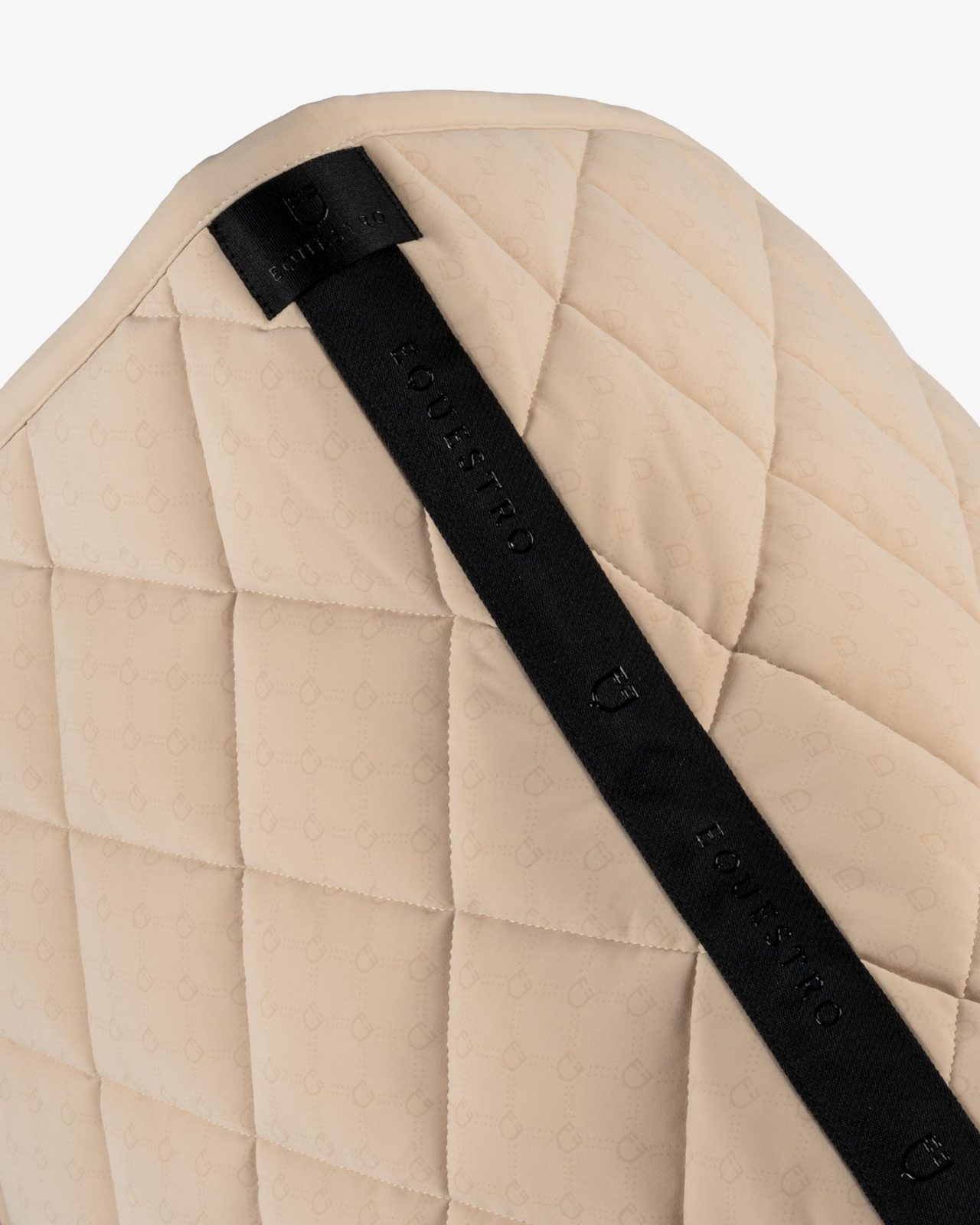 Jumping saddle pad with monogram print