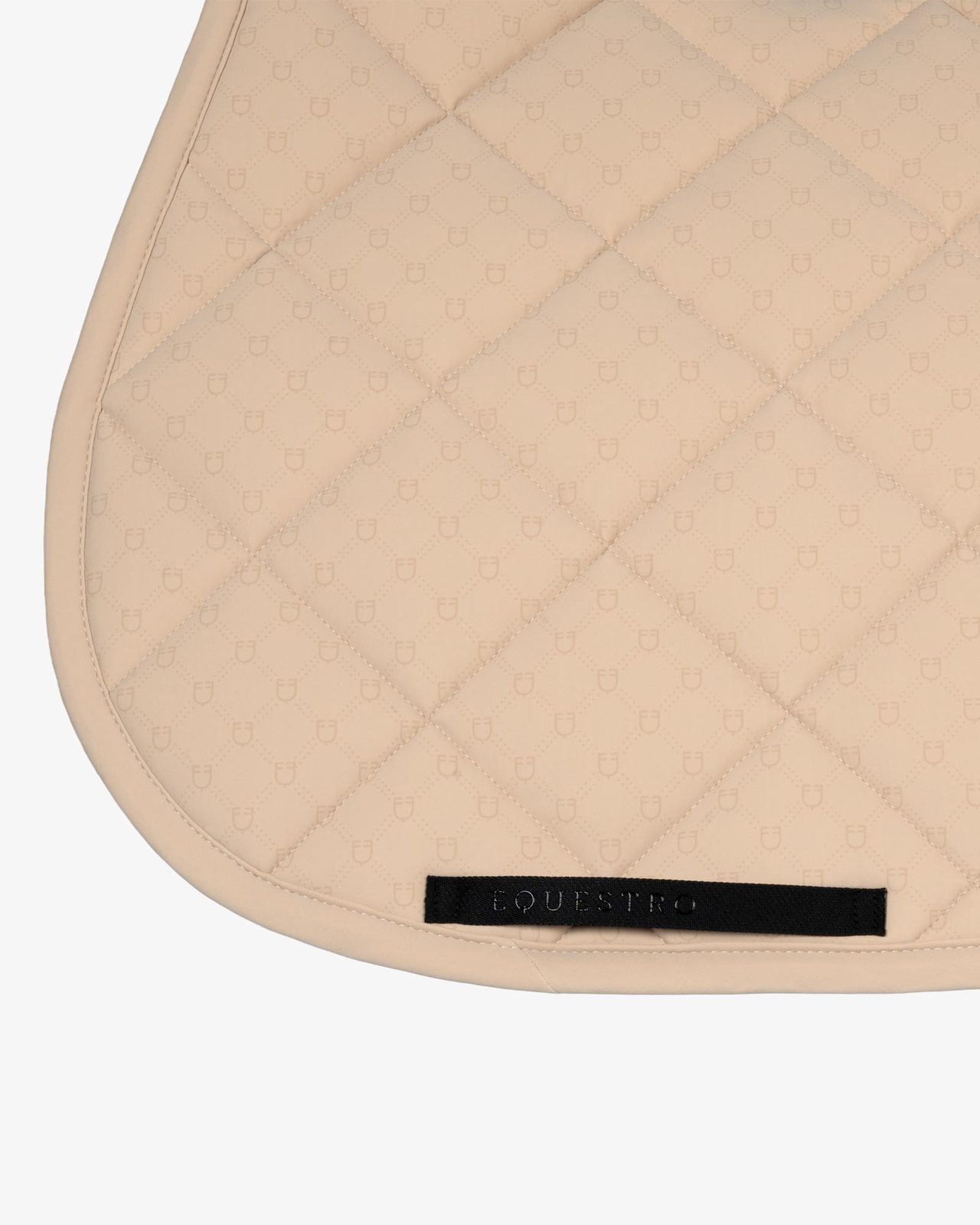 Jumping saddle pad with monogram print