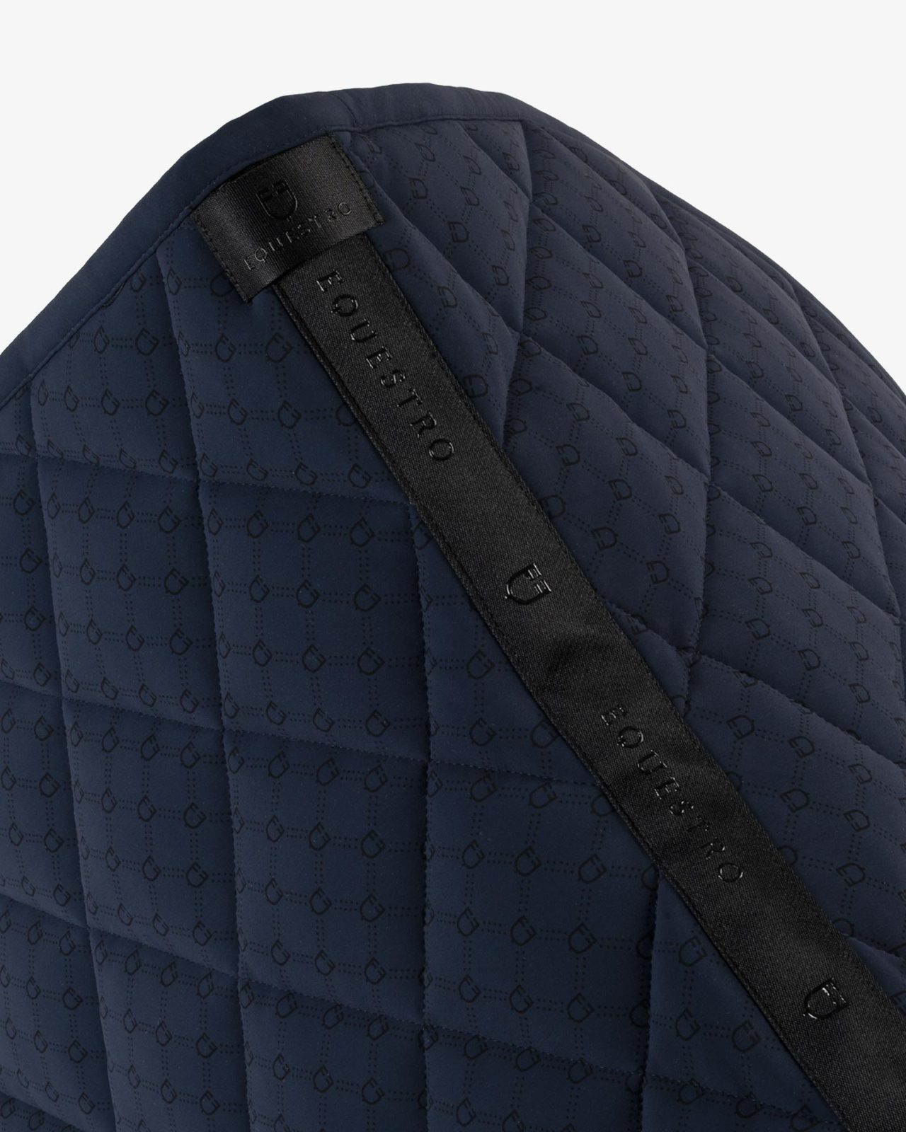 Jumping saddle pad with monogram print