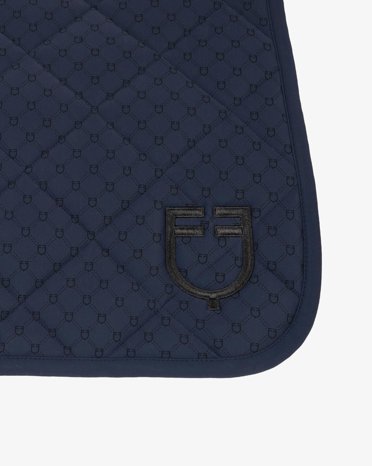 Jumping saddle pad with monogram print