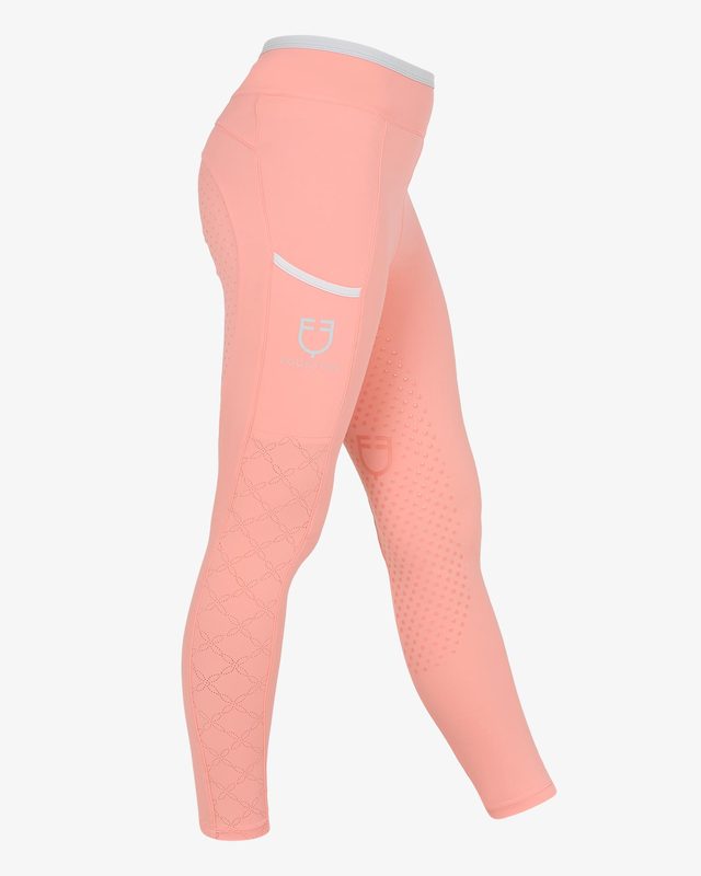 Girls' leggings with perforated decorations