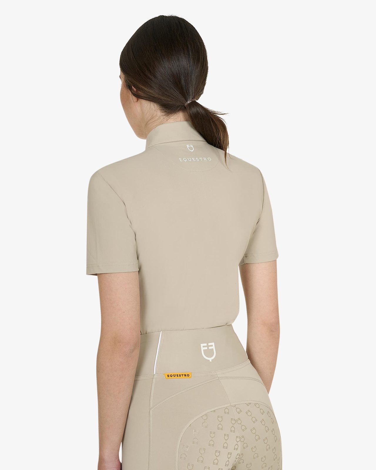 Polo training donna slim fit con zip e perline sul colletto