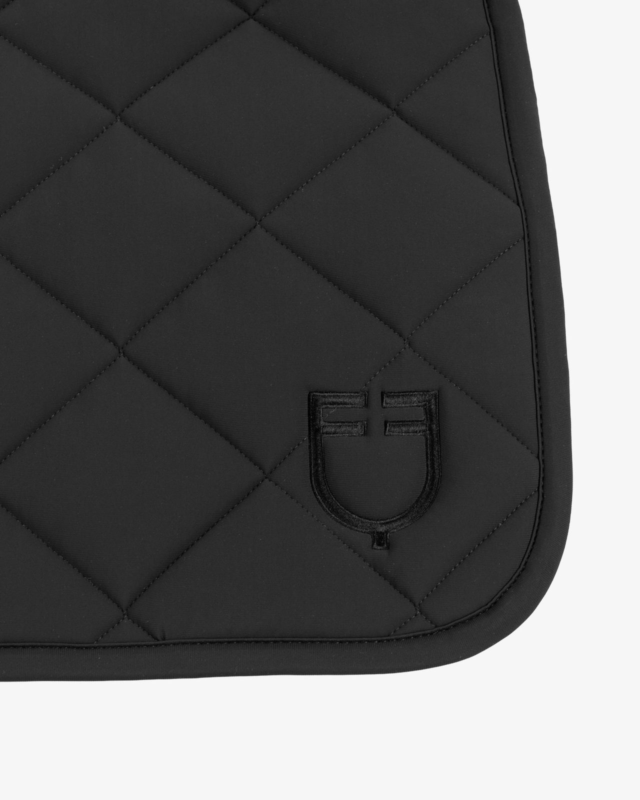 Jumping saddle pad with diamond quilting and embroidered logo