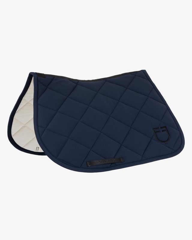 Jumping saddle pad with diamond quilting and embroidered logo