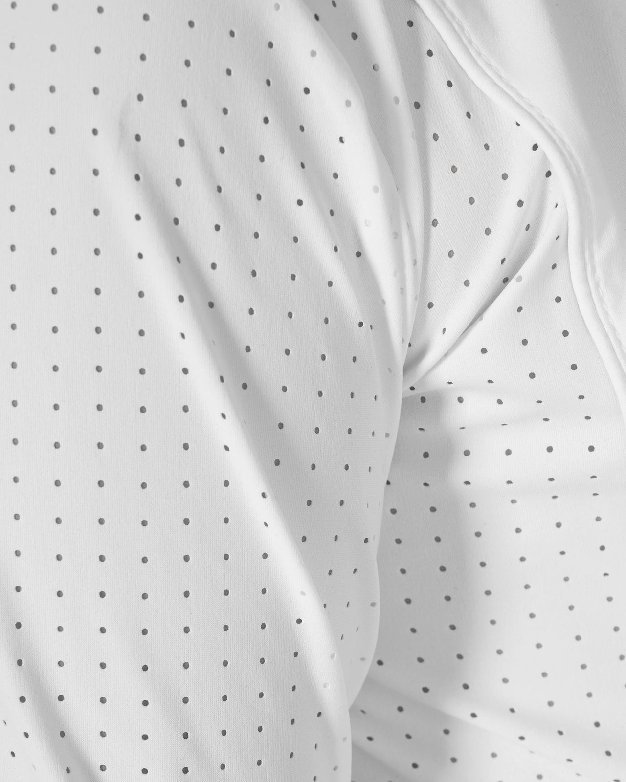 Girls' competition polo shirt with perforated inserts
