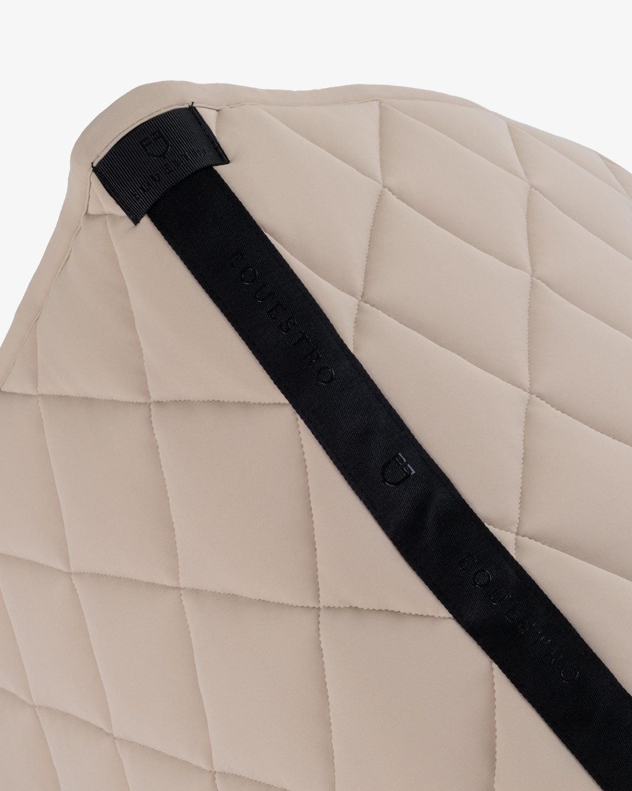 Dressage saddle pad with diamond quilting and embroidered logo