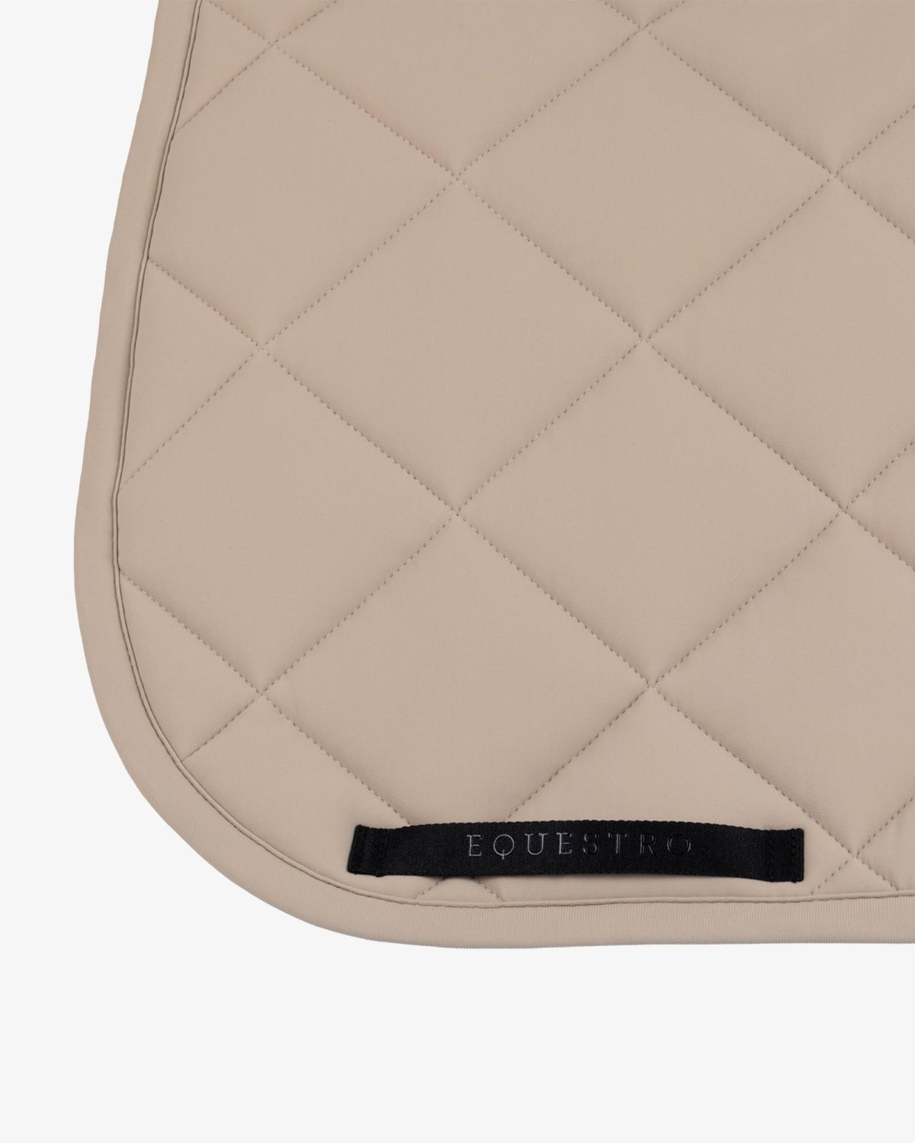 Dressage saddle pad with diamond quilting and embroidered logo