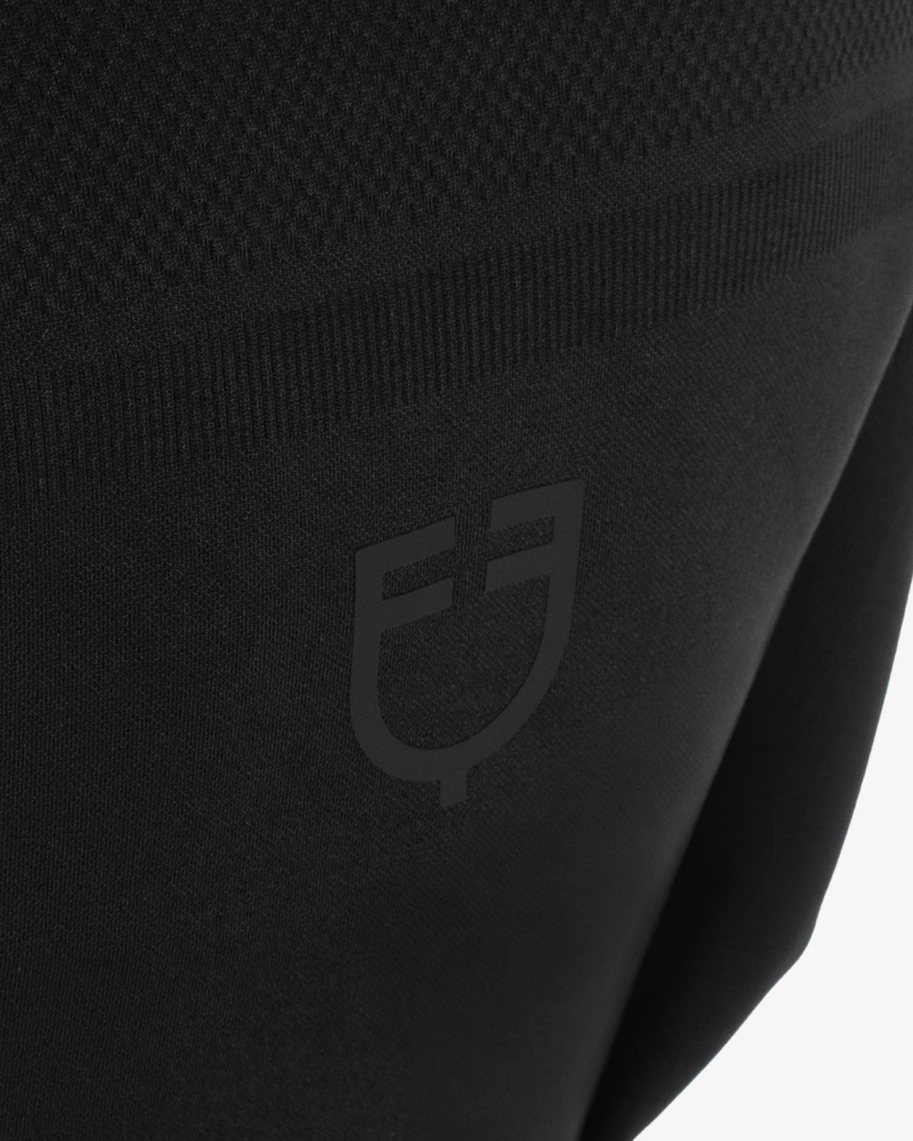Women's training polo shirt in technical knit with zipper