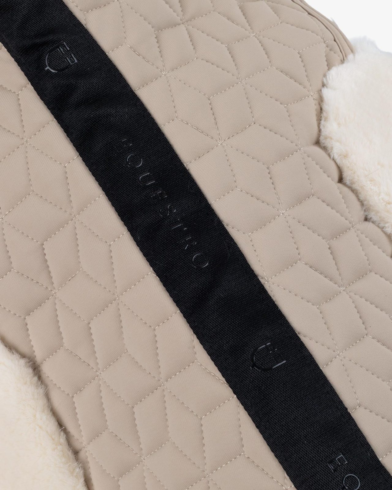 Pad in technical fabric and sheepskin with cube quilting