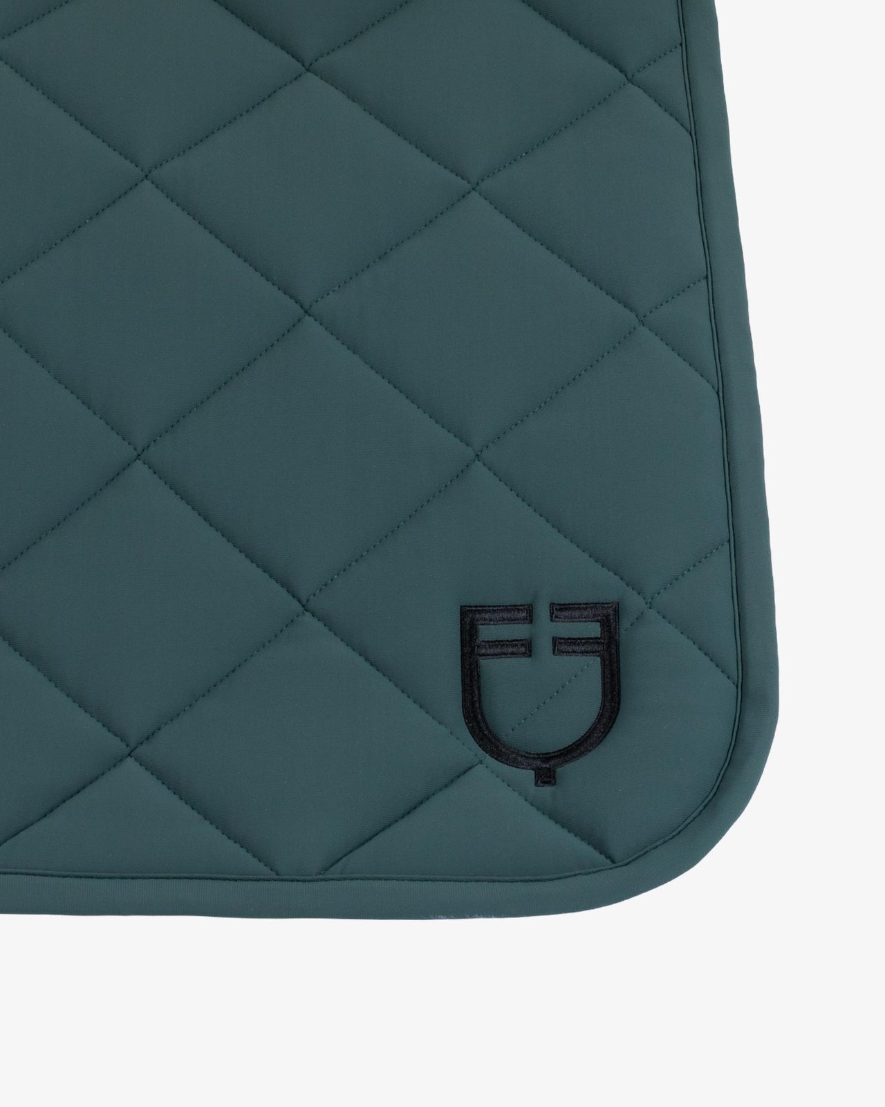 Dressage saddle pad with diamond quilting and embroidered logo