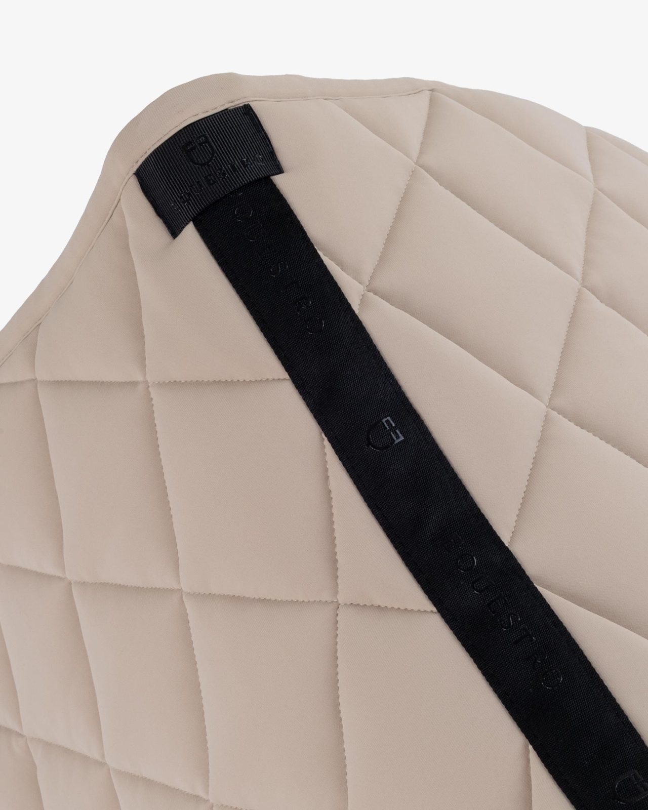 Jumping saddle pad with diamond quilting and embroidered logo