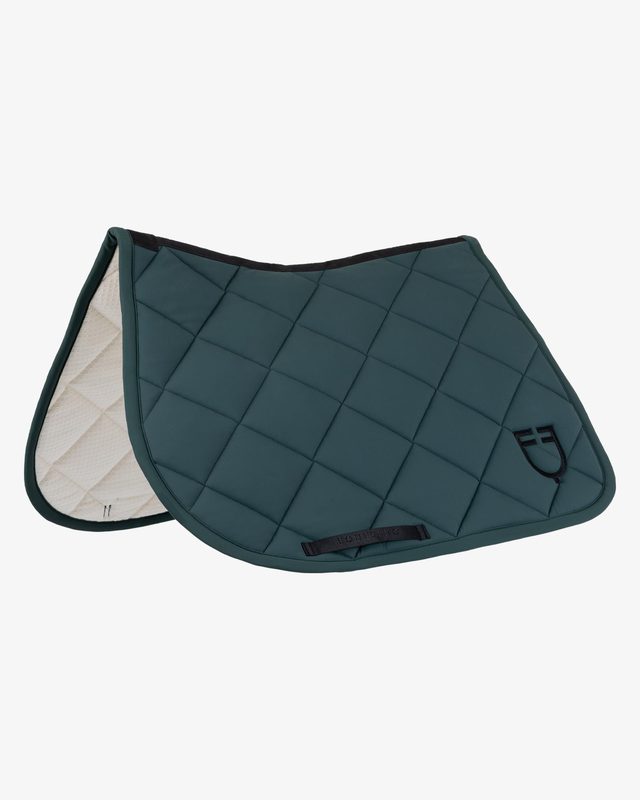 Jumping saddle pad with diamond quilting and embroidered logo