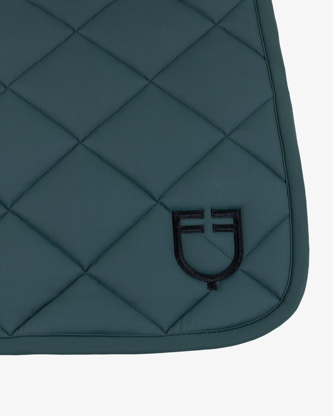 Jumping saddle pad with diamond quilting and embroidered logo